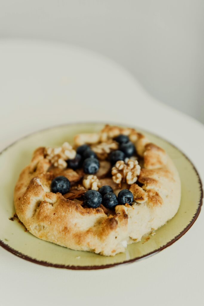 gallete des rois garnished with blueberry and nuts