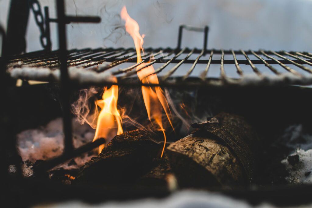 preparing the grill and heating in on fire