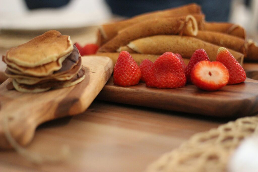 Crepes on Wooden Block with strawberry 