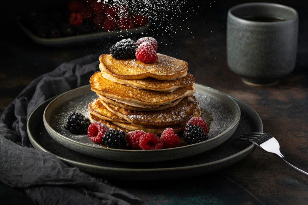 A pile of Crepes Garnished with Berries