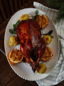 Full Duck Garnished with lemon, Orange and Apple