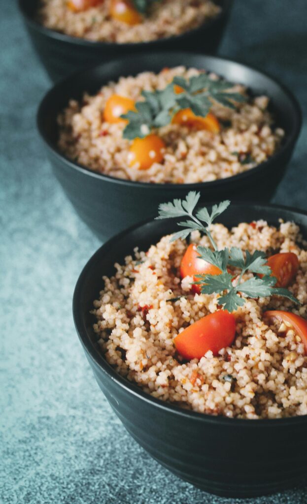 Medeteranian Couscous in a Black Bowl