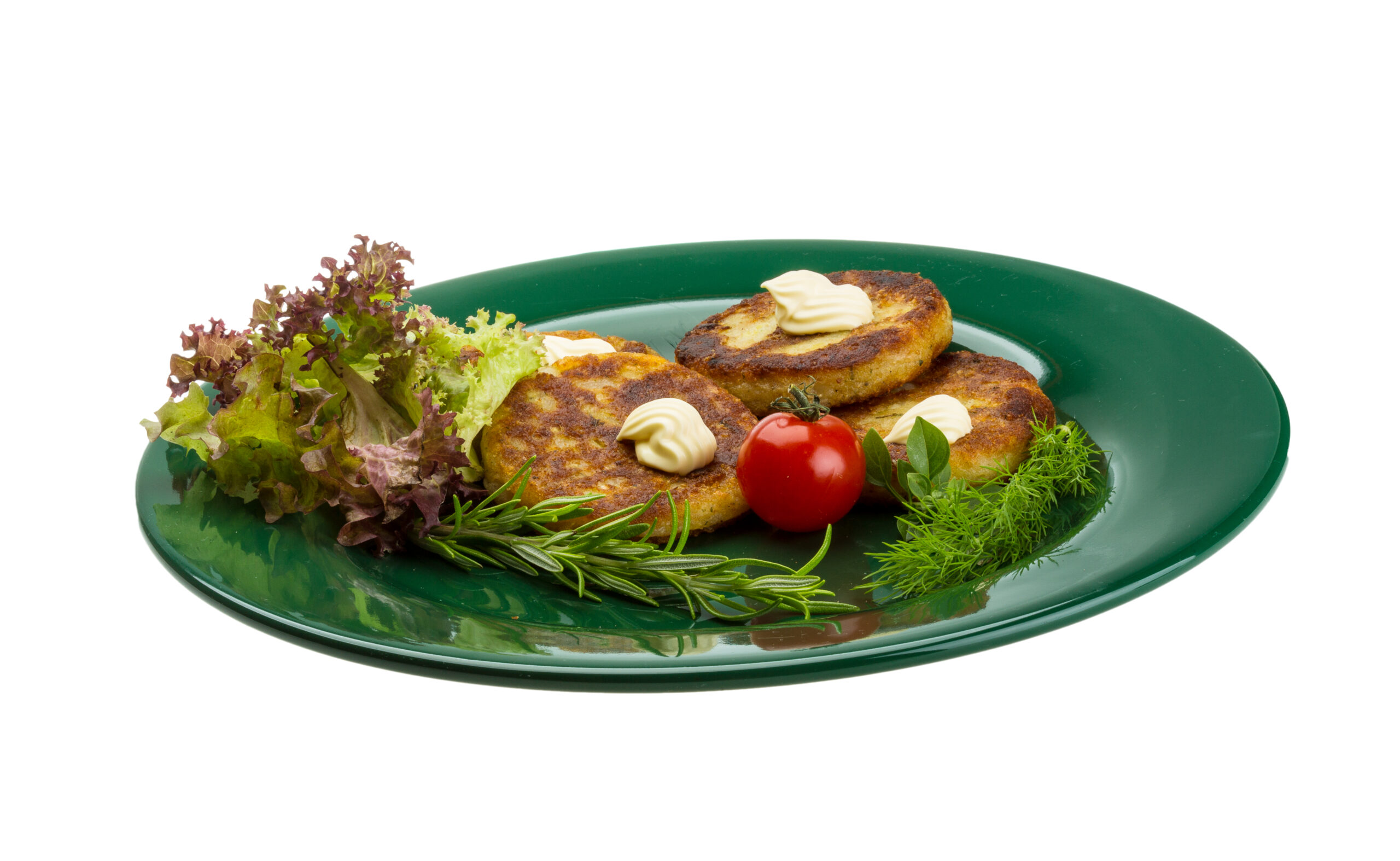 Hash browns with herbs on the plate