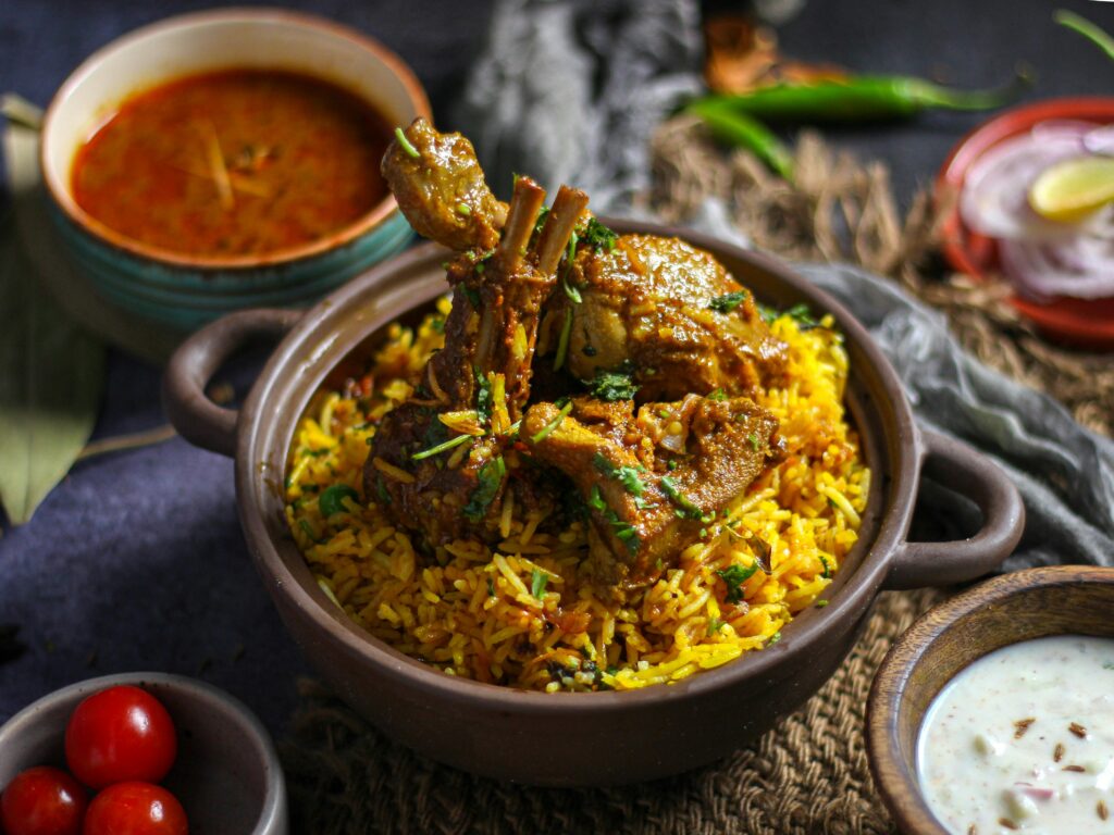 a bowl of Lamb Biryani on a table