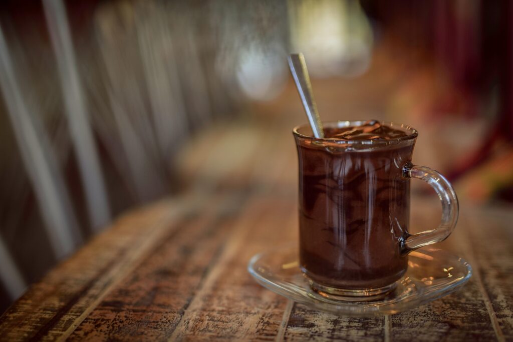 a glass of dark hot chocolate