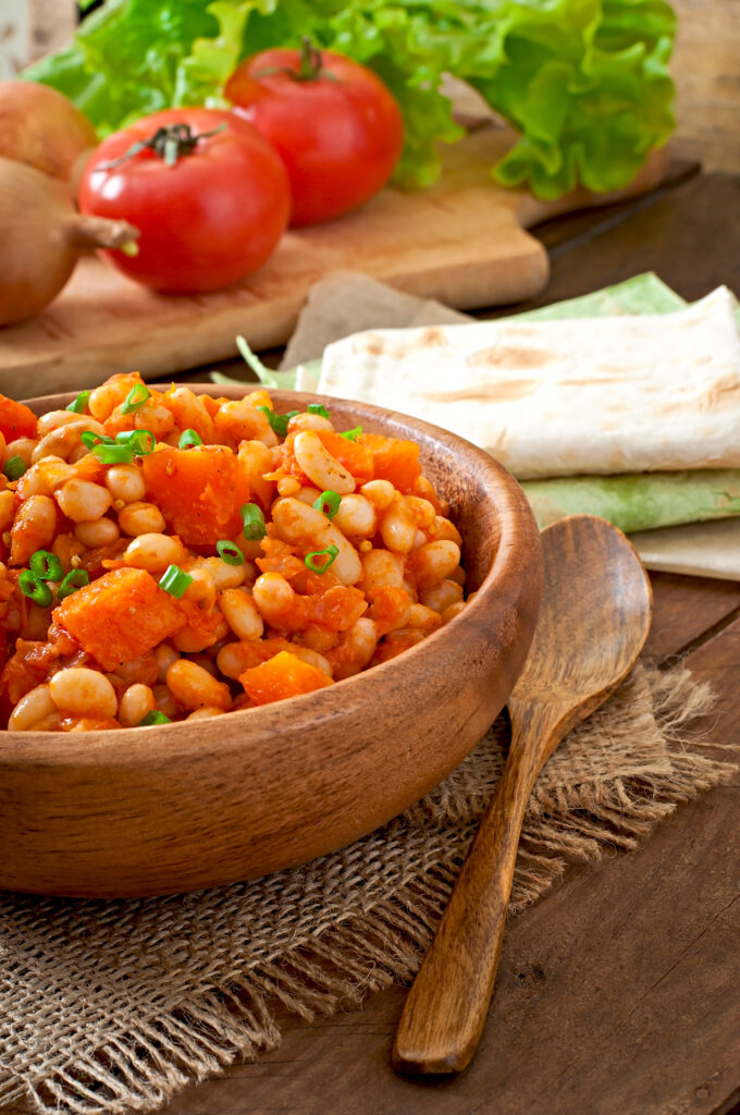 stew beans with vegetables and garnish