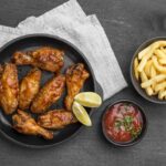 buffalo wings along with french fries