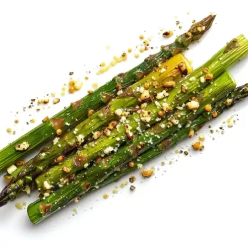 Roasted asparagus spears topped with garlic, Parmesan cheese, and toasted seasoning.